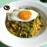 Conceição Discos atrai paulistanos com arroz autoral, ambiente retrô e chef sempre presente